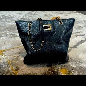 Women’s Black DKNY handbag.